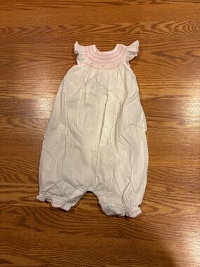 White Baby One-Piece Romper with Pink Smocked Neck